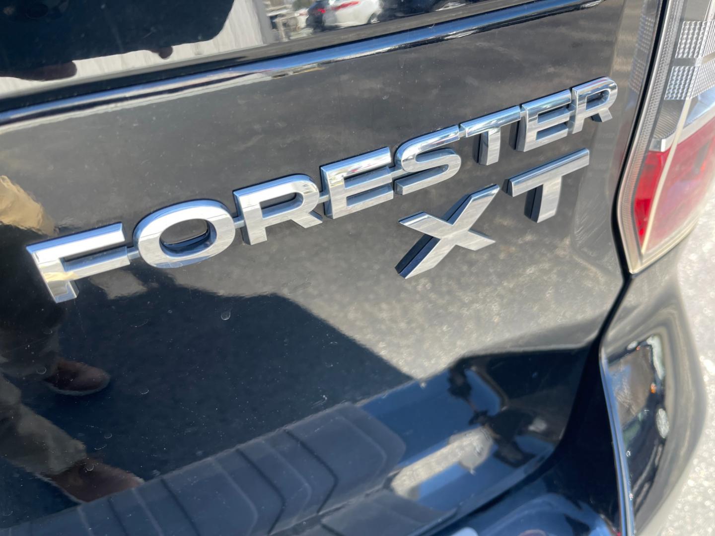 2014 Black /Black Subaru Forester 2.0XT Touring (JF2SJGMC4EH) with an 2.0L H4 SOHC 16V TURBO engine, Automatic transmission, located at 547 E. Main St., Orwell, OH, 44076, (440) 437-5893, 41.535435, -80.847855 - Photo#26